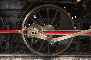 Big closeup Wheels and drive device of old steam locomotive