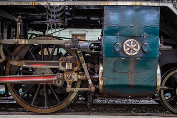 Closeup Wheels and drive device of old steam locomotive
