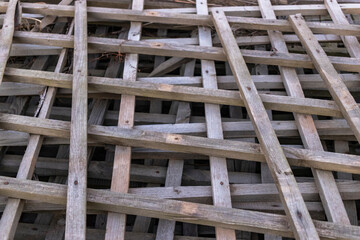 Wood lattice fence texture background. Old wooden structures in the form of lattice.