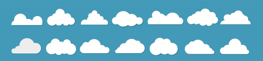 White clouds flat design set on blue background. Vector