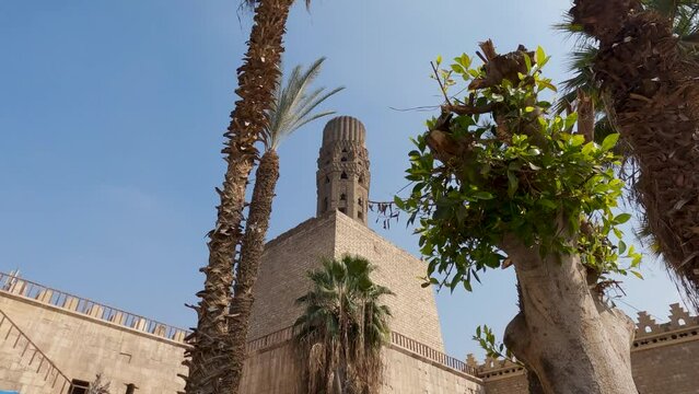 Minaret of Al-Hakim Mosque in Egypt. Low angle