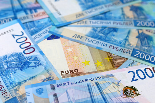 Euro currency surrounded by Russian rubles. Economy of Russia and Europe during european sanctions, exchange rate