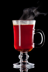 mulled wine isolated on black
