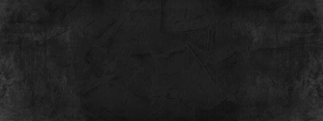 Black anthracite dark gray grey grunge old aged retro vintage stone concrete cement blackboard chalkboard wall floor texture, with cracks - Abstract background banner panorama pattern design template