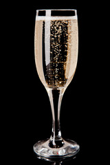 glass of champagne isolated on black