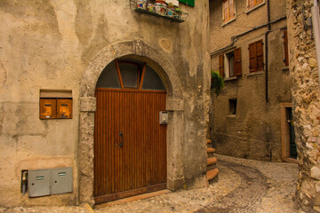 A quiet street in winter in the small town of Malcesine on the north shore of lake Garda, Verona Province, Veneto, north east, Italy
