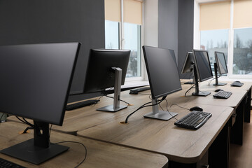 Many modern computers in open space office