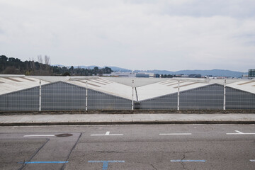 Obraz premium metal facade of a storage building in an industrial landscape