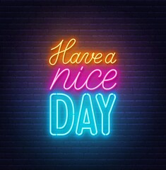 Have a Nice Day neon lettering on brick wall background.