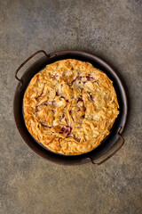 Homemade cherry pie or tart from filo dough. Top view. Vertical orientation