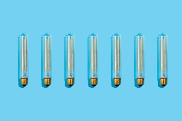 close up pattern of led lamps on an isolated blue background. Energy efficiency concept. Flat lay. Concept ecology, save planet earth, idea, save energy, economy, saving. Earth day.
