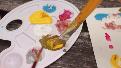 Painting and art creativity lesson at school. Identifying artistically gifted students. Acrylic...