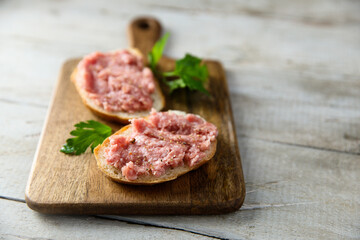 Traditional pork pate or sausage on a white bread