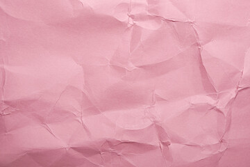 Crumpled Pink paper texture background for design