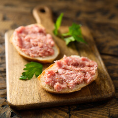 Traditional pork pate or sausage on a white bread