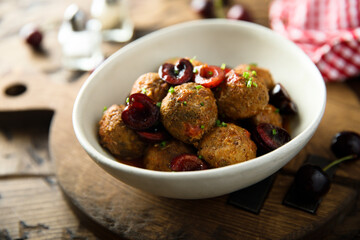 Homemade meatballs with cherries