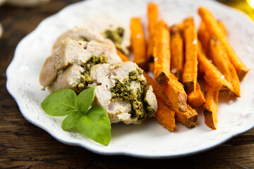 Chicken with pesto and sweet potato fries