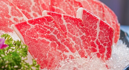 sliced thick frozen raw wagyu beef for hot pot on ice