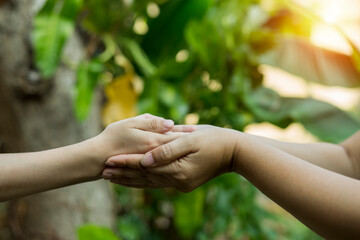 Technology, hand holding with environment Icons over the Network connection on green background