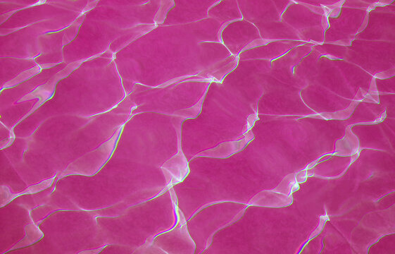 Pop art surreal ultra pink colored water surface reflecting with sunlight for abstract background