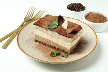 Concept of tasty dessert with Tiramisu cake, close up