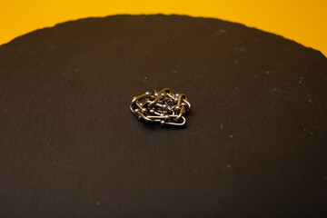 Jewelry from gold on a black stand