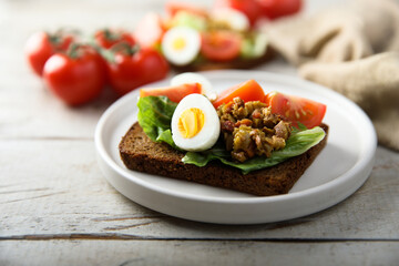 Egg toast with tomato and olive paste