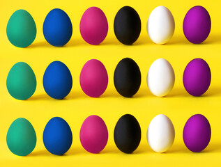 Colorful eggs on the yellow background. Black lives matter, all lives matter, diversity,  equal rights concept