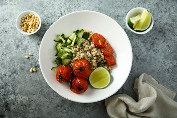 Healthy quinoa bowl with tomato confit