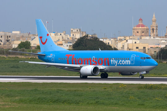 Luqa, Malta - March 4, 2008: Thomsonfly (Thomson Airways) Boeing 737-3U3 (REG: G-THOP) backtracking runway 32 for take off