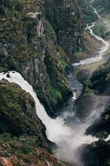 panorama view of waterfall vøringfossen in norway on a rainy summer day
