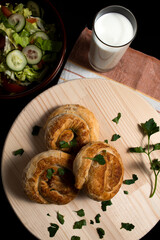 Pie, salad and yogurt served and ready for lunch.