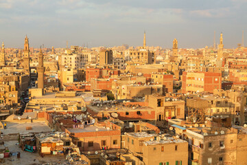 Fototapeta na wymiar Cairo, Egypt - January 2022: Panoramic city view from Bob Zuweila at sunset