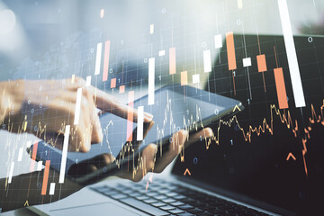 Multi exposure of abstract creative financial graph with world map and finger presses on a digital tablet on background, forex and investment concept
