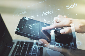 Creative chemistry hologram and hand working with a digital tablet on background, pharmaceutical research concept. Multiexposure