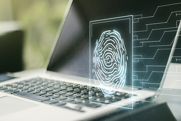 Double exposure of abstract creative fingerprint hologram on computer background, protection of personal information concept