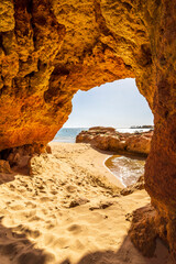 Beautiful sandstone arch with view on marina in Portimao, Ferragudo, Algarve, Portugal