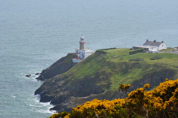 Fototapeta na wymiar Lighthouse on the cliff