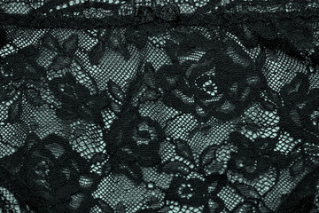Black lace material pattern background - obrazy, fototapety, plakaty