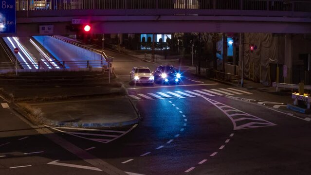 A night timelapse of the traffic jam at the city street in Tokyo