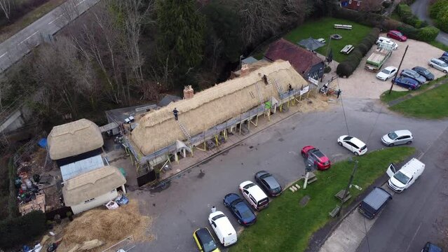 thatchers replacing roof static shot