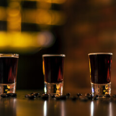 coffee shoots on bar wooden table square