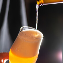 bartender pouring craft beer in to the glass square