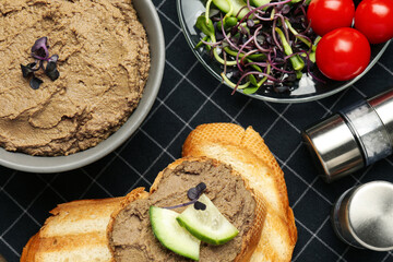 Flat lay composition with delicious liver pate on napkin
