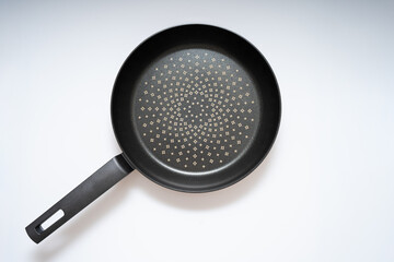 Cooking frying pan on a white background