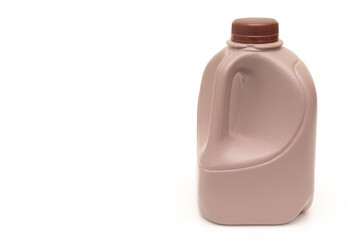 Plastic chocolate milk bottle on white with copy space