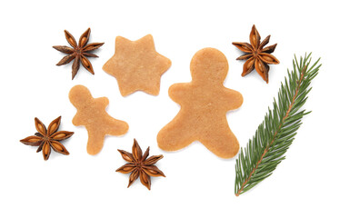 Unbaked Christmas cookies, anise and fir tree twig on white background, top view