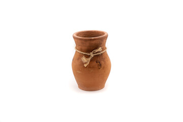 Terracotta vase on a white background. Clay utensils on a white background.