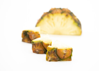 Pineapple slices, Tasty raw whole tropical fruit, healthy nutrition concept