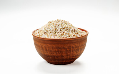 Barley groats in bowls and bags isolated on a white background. High quality photo